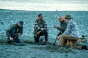Donovan (KEVIN HANCHARD) and Reggie (ALI HASSAN) with fellow treasure hunters