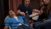 An EMT taking Chris' blood pressure.