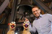 Die Erdmännchen Jan und Henry landen auf der Suche nach einem Drachen der zaubern kann am Kölner Dom und machen eine ohrenbetäubende Entdeckung.