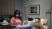 Dr. Lee uses a laser on Kaitlin Rose’s arms to rid of them of the marks from years of illicit IV drug use.