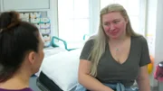 Abi after being on treatment for one month, with Dr Emma.