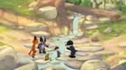 Rosie, die Zwillinge und Emmie entdecken im seichten Wasser des Flusses viele kleine Froscheier.