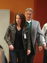 Gibbs (Mark Harmon, right) and the NCIS team spring into action to find the assailant responsible for beating a Marine to death in his own backyard.