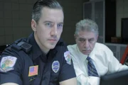 Officer Timothy Peck (l.); Detective Randal Roberts (r.)