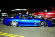 Dennis Bailey guides his '01 Camaro SS, Silverback Gorilla, to the starting line.
