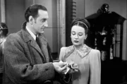 Sherlock Holmes (Basil Rathbone), Hilda Courtney (Patricia Morison)