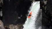 Ryan Lucas kayaks down a large waterfall. (Ryan Lucas)
