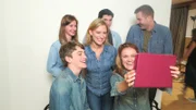 The Bessey family taking a selfie.