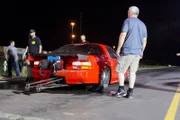 Out of town racer, Harold Coates, gets his ’69 Camaro to the starting line before racing Memphis Street Outlaw Lee Roberts.
