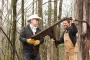 L-R: Marty and Anthony are looking for usable materials on the Siefker homestead.