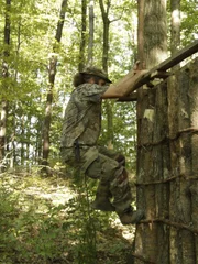 Willy climbs to the top of the trap to make some final touches