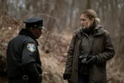 l-r: Chief Carter (John Douglas Thompson), Detective Mare Sheehan (Kate Winslet)