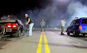 In the second race of the night, Jeff James and his black Corvette, Big Block Killer, line up against his next victim.