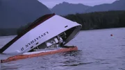 Overturned ship sinking.