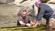 Episode Laos. Dave Canterbury and Cody Lundin building a bamboo raft in province of Bolikhamxay, Laos PRD.