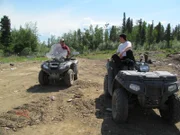 Charlie (left) and Bob (right) Wright go to the Tanana dump to hunt the bear.