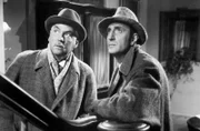 v.li.: Dr. Watson (Nigel Bruce), Sherlock Holmes (Basil Rathbone)
