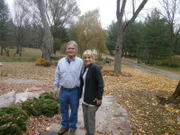 Recent lottery winners Joe and Rhonda Meath on the front sidewalk of the Farm property, as seen on My Lottery Dream Home. (portrait)