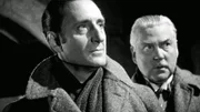 Sherlock Holmes (Basil Rathbone, l.) und Doctor Watson.