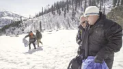 Rock Raiders walk in the snow of the Himalayas