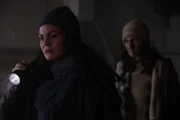Vagrant (Kelly Marz) sneaks up behind Debra (Liz Days)