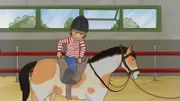 Conni lernt schnell, wie sie sich auf einem Pferd im Sattel halten kann.