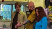 Dean, Jackson Galaxy and Brenda inside their home.