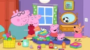 Es ist der letzte Tag des Urlaubs und Peppa und Schorsch bekommen ein Abschiedsgeschenk vom kleinen Känguru (r.): einen Bumerang.
