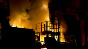Flames rise from an electric arc furnace (EAF) at a facility in Indiana, U.S. Photographer: Daniel Acker/Bloomberg