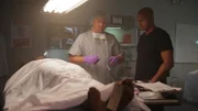 A detective talks with a mortician.