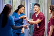 CHICAGO MED -- "All The Lonely People" Episode 410 -- Pictured: (l-r) Yaya DaCosta as April Sexton, Brian Tee as Ethan Choi.