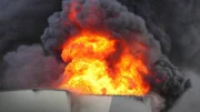 Flames and black smoke - air pollution concept.
