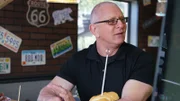 Chef Robert Irvine reviews the food from the old menu at Turnpike's Rest Stop, as seen on Restaurant: Impossible, Season 18.