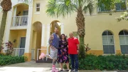From left to right: Host David Bromstad, Giovanna Lupo, and Giovanni Salazar pose for a picture outside of House 1, Cooper Colony, Hero.