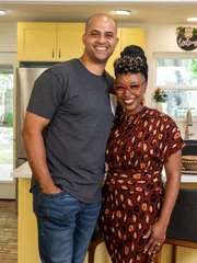 Portrait of hosts Jon Pierre & Mary Tjon-Joe-Pin in the newly renovated kitchen in the Rohloff home as seen on Two Steps Home.