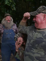 Wild Bill posing with Willy and Huckleberry.