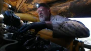 SALCHA RIVER, Alaska - Jim Evridge works on the Frankendozer.