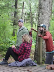 Misty and Kevin McCray are laughing at Gauge while enjoying the forest with Joshua and Jake Wilson.