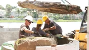 John "Old Man" Messner, Jane "Woman" Werley, and Chris "Crash" Warren install rocks.
