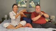 David and Annie imitate a hand motion from the scene.