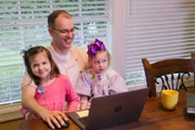 Neal Salerno spending time with Vivian and Lillian Salerno.