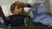 A boy on examination at the doctor.
