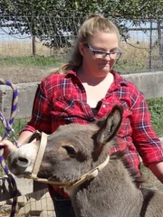 Jenny Zeller and Amy work at the mini donkey ranch.
