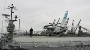 Dr. James Delgao aboard the aircraft carrier USS Hornet