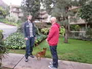 Jackson Galaxy and SteevJ talking outside a home.