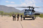 Nogales, Arizona, USA: Officers train with a blackhawk helicopter. Agents must train to prepare themselves for fights with drug smugglers and cartels.