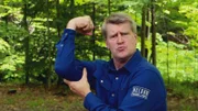 Pete Nelson showing off his muscles during the treehouse build.