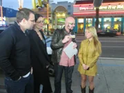 Jackson Galaxy talking to people on the street.