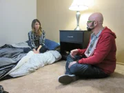 Jackson Galaxy and Laura talking in her home.