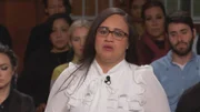 People sitting in a courtroom